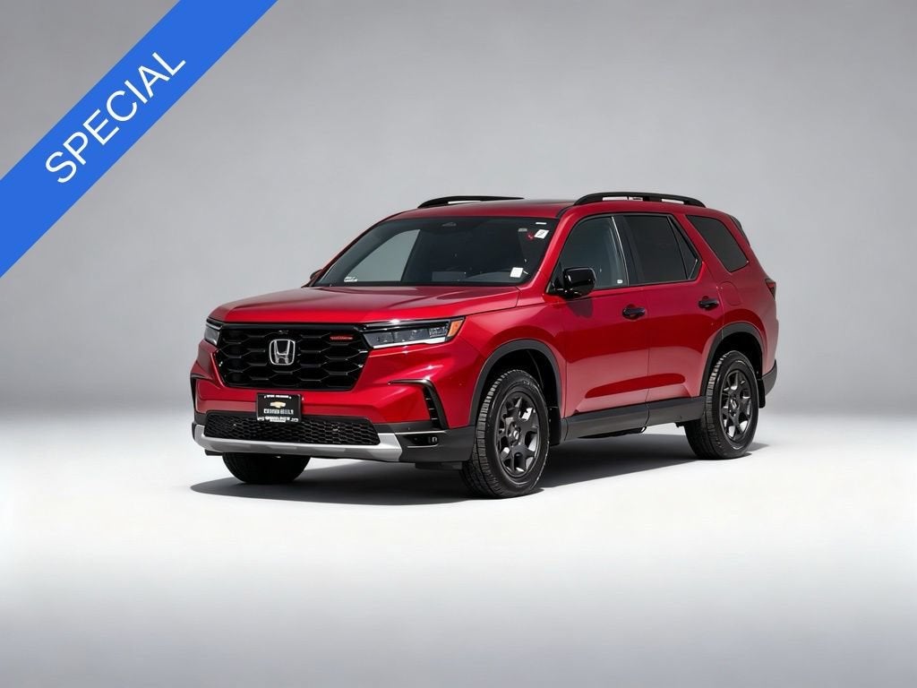 2025 Honda Pilot TrailSport in Red — front three-quarter view